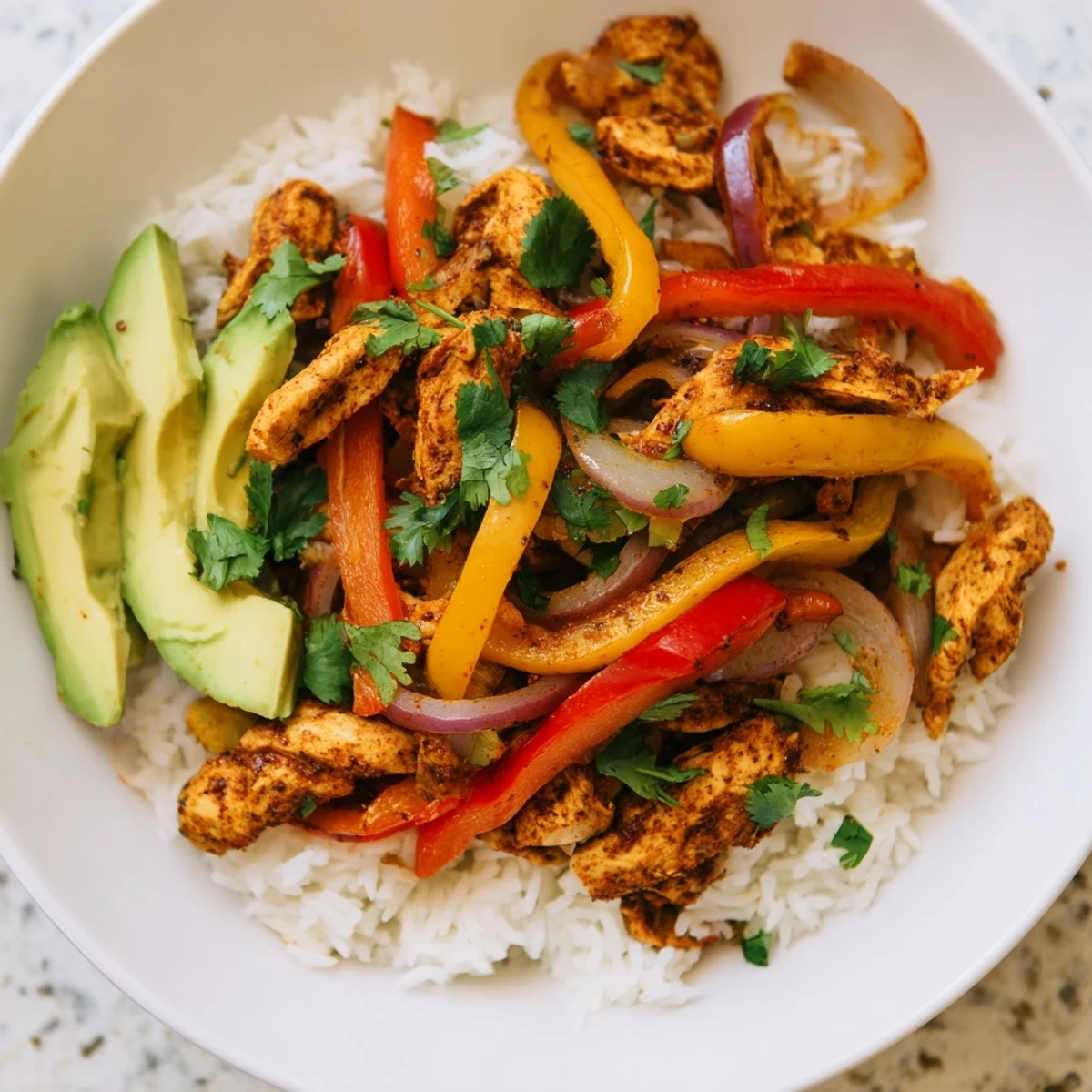 Savory Chicken Fajita Bowl featuring seasoned chicken and peppers, perfect for a quick and easy weeknight dinner.
