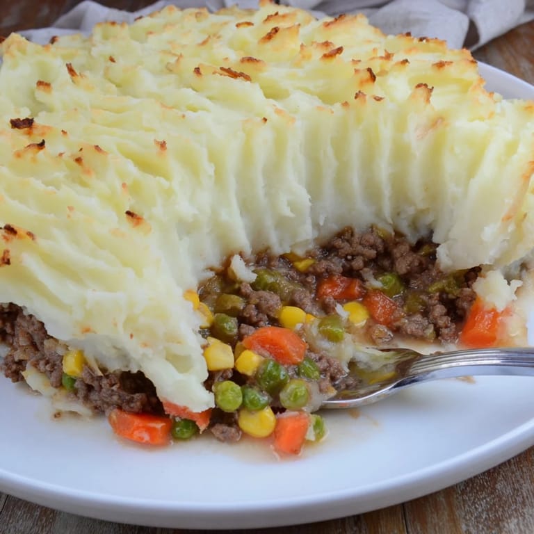 A comforting, easy-to-make Shepherd's Pie, perfectly baked and ready to be served for dinner.
