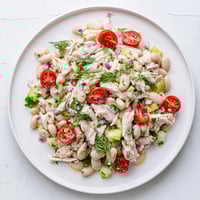 Tender chicken, creamy white beans, and crisp celery are tossed in a bright lemon vinaigrette for a refreshing Lemony White Bean Chicken Salad.